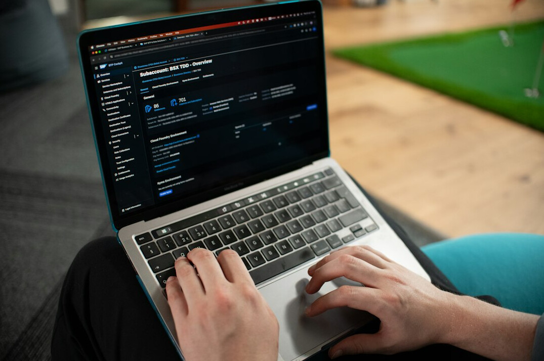 person learning python on laptop