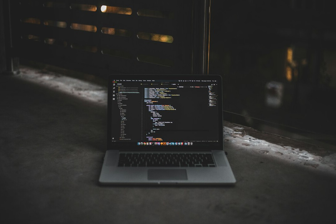 laptop with programming code